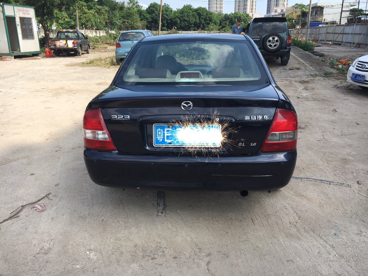 06年马自达323,1.6手波,一口价9800元